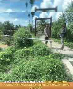 Akses Warga Terancam, Brimob Sumut Lakukan Pengecekan Jembatan Gantung di Tukka