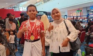 Siswa SMPN 12 Medan Bramono Sinurat Raih Kemenangan di Kompetisi MMA U12