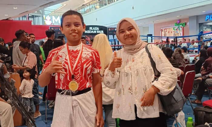 Siswa SMPN 12 Medan Bramono Sinurat Raih Kemenangan di Kompetisi MMA U12